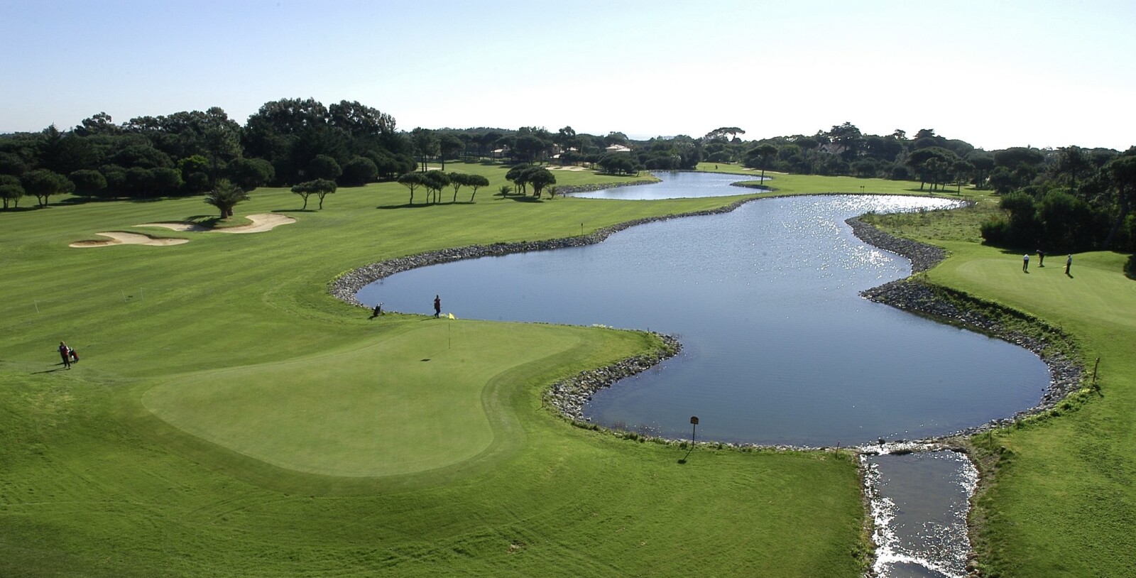 The 18th hole at Quinta Da Marinha is a challenging par five featuring two lakes